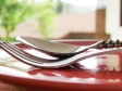 cutlery-on-red-plate-1416090-640x480
